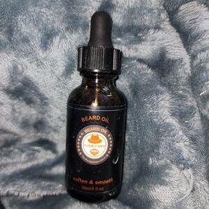 Bottle of XIKEZAN beard oil, designed to condition facial hair Beard Oil